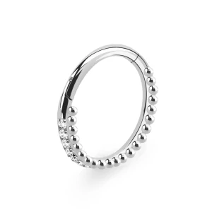 Ocelový kroužek s dvojitou řadou kamínků a kuliček 