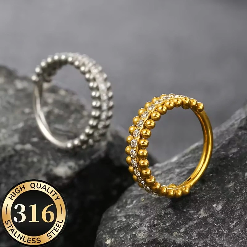 Zlatý kroužek s dvojitou řadou kuliček a krystaly v průměru 8mm