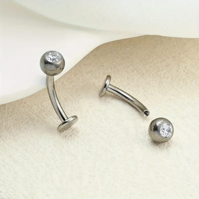 Titanový piercing do pupíku s krystaly zirkonu – G23